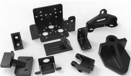 Assorted black metal brackets and mounting components used in industrial assemblies and structural support applications.