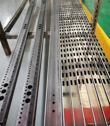 CNC laser-cut metal tubes designed for use in storage and display racks.